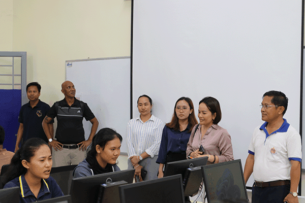 C.T.D team members visiting a computer learning room